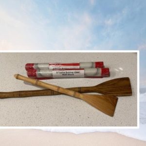 2 wooden handmade spatulas and 2 silicone half sheet baking liners